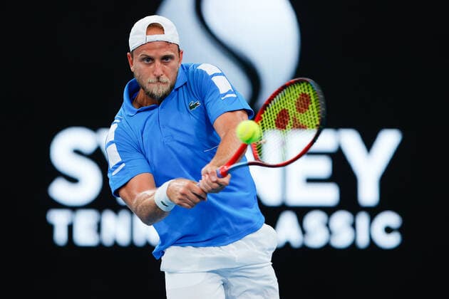 Denis Kudla of USA hits a backhand against David Goffin of Belgium during the Sydney Tennis Classic 2022 at Sydney Olympic Park Tennis Centre, Sydney, Australia on 12 January 2022. Copyright: xPeterxDovganx 30470295