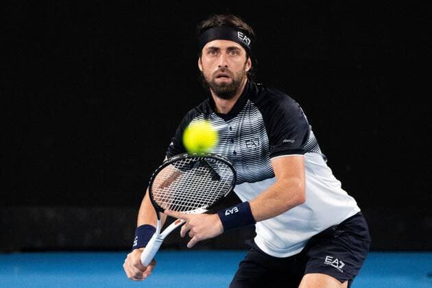 Mandatory Credit: Photo by Shutterstock (12757262dq) Nikoloz Basilashvili in action during his round of 16 match Sydney Tennis Classic, Day 4, Tennis, Olympic Park, Sydney, Australia - 12 Jan 2022 Sydney Tennis Classic, Day 4, Tennis, Olympic Park, Sydney, Australia - 12 Jan 2022  Copyright: xShutterstockx 12757262dq