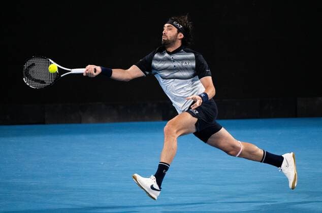 Mandatory Credit: Photo by Shutterstock (12757262ds) Nikoloz Basilashvili in action during his round of 16 match Sydney Tennis Classic, Day 4, Tennis, Olympic Park, Sydney, Australia - 12 Jan 2022 Sydney Tennis Classic, Day 4, Tennis, Olympic Park, Sydney, Australia - 12 Jan 2022  Copyright: xShutterstockx 12757262ds