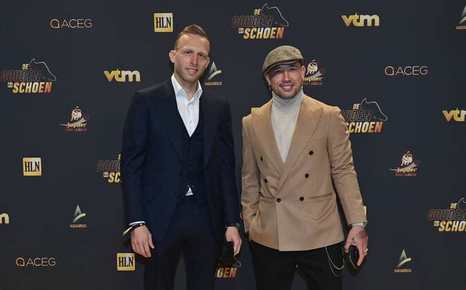 Antwerp s Ritchie De Laet and Antwerp s Radja Nainggolan pictured on the red carpet at the arrival for the 68th edition of the Golden Shoe award ceremony, Wednesday 12 January 2022, in Puurs. The Golden Shoe (Gouden Schoen Soulier d Or) is an award for the best soccer player of the Belgian Jupiler Pro League championship during the calender year 2019. DIRKxWAEM  x06898452x