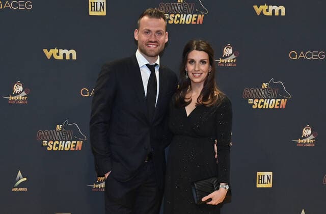 Club s goalkeeper Simon Mignolet and her partner pictured on the red carpet at the arrival for the 68th edition of the Golden Shoe award ceremony, Wednesday 12 January 2022, in Puurs. The Golden Shoe (Gouden Schoen Soulier d Or) is an award for the best soccer player of the Belgian Jupiler Pro League championship during the calender year 2019. DIRKxWAEM  x3172321x