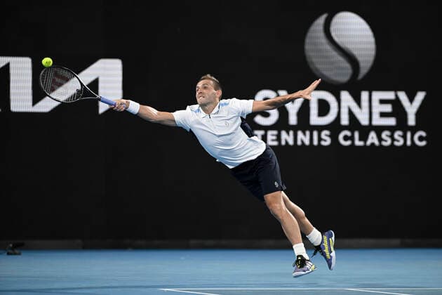 13th January 2022: Ken Rosewall Arena, Sydney Olympic Park, Sydney, Australia; Sydney Tennis Classic, Day 5: Daniel Evans of Great Britain stretches to reach the ball in his match against Maxime Cressy of USA  ActionPlus12355903 NigelxOwen