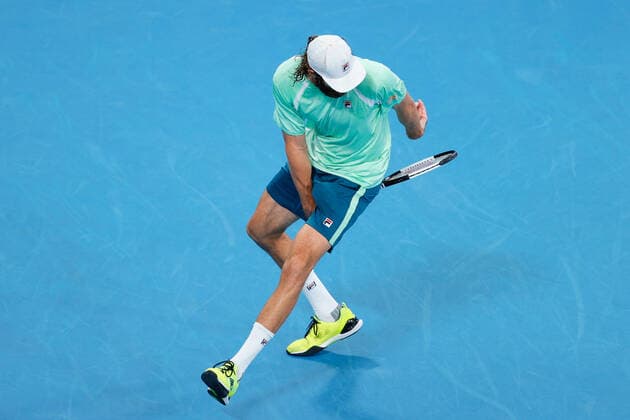 Reilly Opelka of USA plays a shot between his legs against Andy Murray of Great Britain during the MenÕs Semi Final at the Sydney Tennis Classic 2022 at Sydney Olympic Park Tennis Centre, Sydney, Australia on 14 January 2022. Copyright: xPeterxDovganx 30470650