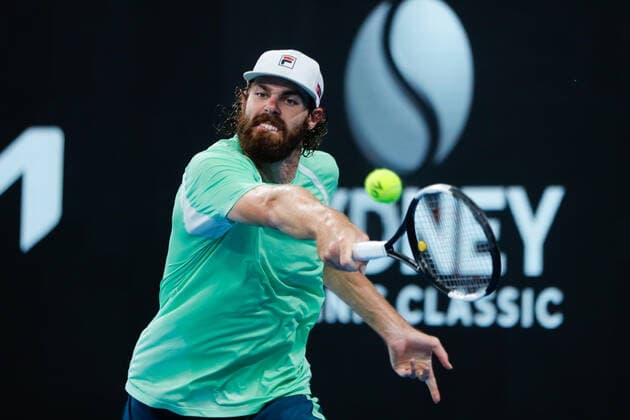 Reilly Opelka of USA plays a backhand against Andy Murray of Great Britain during the MenÕs Semi Final at the Sydney Tennis Classic 2022 at Sydney Olympic Park Tennis Centre, Sydney, Australia on 14 January 2022. Copyright: xPeterxDovganx 30470651