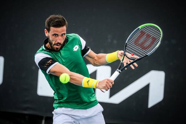 January 14, 2022: Damir Dzumhur of Bosnia during his match against Marco Trungelliti of Argentina on day 5 of 2022 Australian Open Qualifying at Melbourne Park on January 14, 2022 in Melbourne, Australia. - ZUMAp121 20220114_zsp_p121_076 Copyright: xChrisxPutnamx