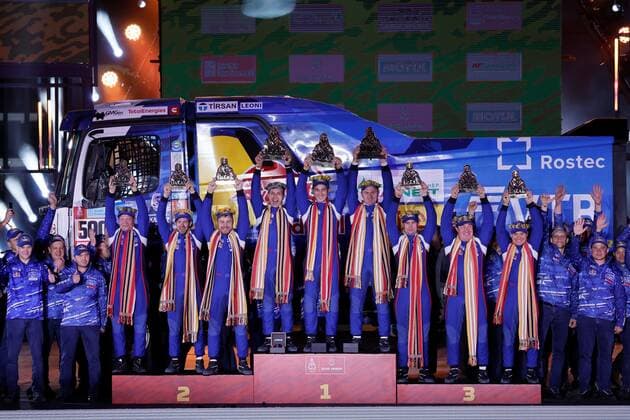 Russian drivers Dmitry Sotnikov (C-1st), Eduard Nikolaev (L-2nd) and Anton Shibalov (R-3rd) celebrate on the podium of the truck class after the 12ª and last stage of the Dakar rally, in Jeddah, Saudi Arabia, 14 January 2021. 12ª and last stage of Dakar rally !ACHTUNG: NUR REDAKTIONELLE NUTZUNG!  Copyright: xBielxAlinox GRAF9953 20220114-6b66b81143207a5ab0d5564f80da2bb72e14632e