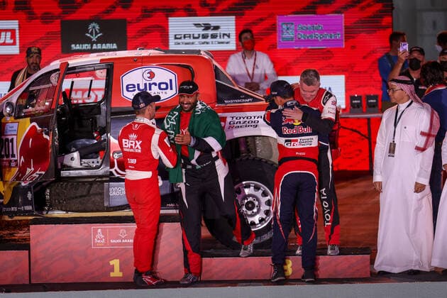 201 Al-Attiyah Nasser (qat), Baumel Batthieu (fra), Toyota Gazoo Racing, Toyota GR DKR Hilux T1+, Auto FIA T1 T2, W2RC, portrait, podium with 211 Loeb Sebastien (fra), Lurquin Fabian (bel), Bahrain Raid Xtreme, BRX Prodrive Hunter T1+, Auto FIA T1 T2, W2RC and 205 Al Rajhi Yazeed (sau), Orr Michael (gbr), Overdrive Toyota, Toyota Hilux Overdrive, Auto FIA T1 T2, W2RC during the Podium Finish of the Dakar Rally 2022, on January 14th 2022 in Jeddah, Saudi Arabia - AUTO - DAKAR 2022 - PODIUM FINISH DPPI Panoramic  JDR55412