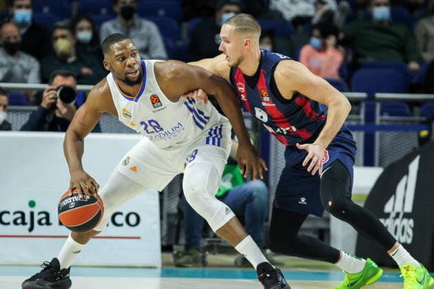 January 14, 2022, MADRID, MADRID, SPAIN: Guerschon Yabusele of Real Madrid and Tadas Sedekerskis of of Baskonia in action during Turkish Airlines Euroleague basketball match between Real Madrid and Bitci Baskonia Vitoria Gasteiz at Wizink Center on January 14, 2022 in Madrid, Spain. MADRID SPAIN - ZUMAa181 20220114_zaa_a181_029 Copyright: xIrinaxR.xHipolitox