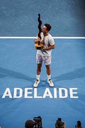 ADELAIDE INTERNATIONAL 2 FINAL, Thanasi Kokkinakis of Australia celebrates victory with the trophy after the match against Arthur Rinderknech of France during the Adelaide International 2 Mens Final in Adelaide, Saturday, January 15, 2022. ( NO ARCHIVING, EDITORIAL USE ONLY, NO USE IN BOOKS WITHOUT CONSENT ADELAIDE SA AUSTRALIA  Copyright: xMATTxTURNERx 20220115001613573970