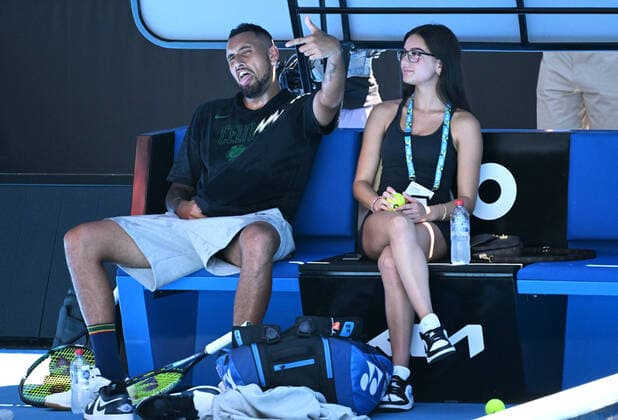 TENNIS AUSTRALIAN OPEN PRACTICE, Nick Kyrgios of Australia reacts to photographers while sitting with girlfriend Costeen Hatzi during a practice session ahead of the Australian Open, at Melbourne Park in Melbourne, Sunday, January 16, 2022. ( NO ARCHIVING, EDITORIAL USE ONLY, NO USE IN BOOKS WITHOUT CONSENT MELBOURNE VIC AUSTRALIA  Copyright: xDAVExHUNTx 20220116001613837521