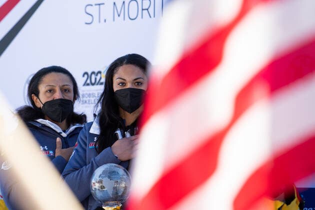 Elana Meyers Taylor, Kaysha Love USA during national anthem at overall World Cup victory, CH, IBSF World Cup and European Championships, St Moritz Two-man Bobsled Women, 16 01 2022, 2021 2022 season CH, IBSF World Cup and European Championships, St Moritz Two-man Bobsled Women, 16 01 2022, 2021 2022 season Copyright: xEibner Memmlerx EP_MMR