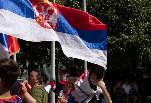 (220116) -- MELBOURNE, Jan. 16, 2022 -- Fans of Novak Djokovic gather outside Federal Court of Australia, in Melbourne, Australia on Jan. 16, 2022. Australia s Federal Court on Jan. 16, 2022 dismissed the world No. 1 s application to have his visa cancelation overturned one day before the start of the Australian Open, in which Djokovic had been expected to defend his title. ) (SP)AUSTRALIA-MELBOURNE-TENNIS-DJOKOVIC BaixXuefei 