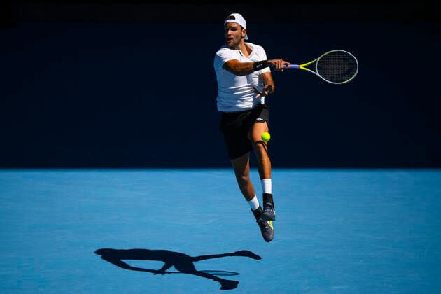 TENNIS AUSTRALIAN OPEN, Matteo Berrettini of Italy plays a shot during his first Round Men s singles match against Brandon Nakashima of the United States on Day 1 of the Australian Open, at Melbourne Park, in Melbourne, Monday, January 17, 2022. ( NO ARCHIVING, EDITORIAL USE ONLY, NO USE IN BOOKS WITHOUT CONSENT MELBOURNE VIC AUSTRALIA  Copyright: xDEANxLEWINSx 20220117001614131946