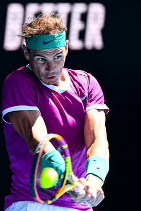TENNIS AUSTRALIAN OPEN, Rafael Nadal of Spain plays a shot during his first Round Men s singles match against Marcos Giron of the United States on Day 1 of the Australian Open, at Melbourne Park, in Melbourne, Monday, January 17, 2022. ( NO ARCHIVING, EDITORIAL USE ONLY, NO USE IN BOOKS WITHOUT CONSENT MELBOURNE VIC AUSTRALIA  Copyright: xDAVExHUNTx 20220117001614133768