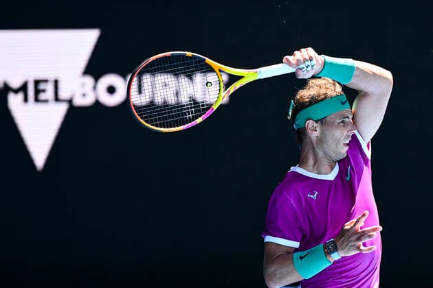 TENNIS AUSTRALIAN OPEN, Rafael Nadal of Spain plays a shot during his first Round Men s singles match against Marcos Giron of the United States on Day 1 of the Australian Open, at Melbourne Park, in Melbourne, Monday, January 17, 2022. ( NO ARCHIVING, EDITORIAL USE ONLY, NO USE IN BOOKS WITHOUT CONSENT MELBOURNE VIC AUSTRALIA  Copyright: xDAVExHUNTx 20220117001614133836