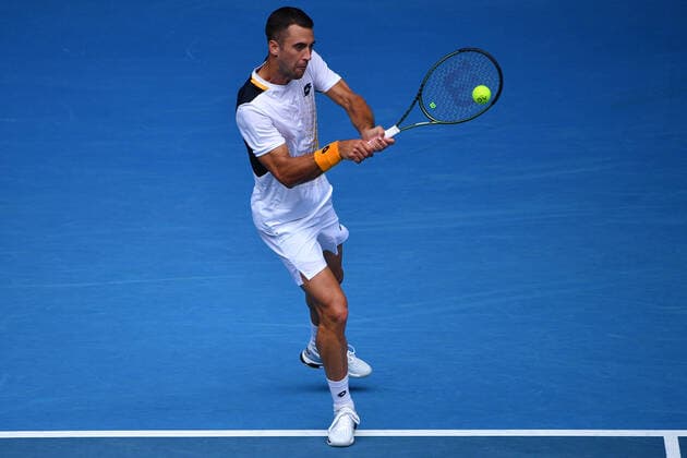 TENNIS AUSTRALIAN OPEN, Laslo Djere of Serbia in action during their Mens singles match against Denis Shapovalov of Canada on Day 1 of the Australian Open tennis tournament, at Melbourne Park, in Melbourne, Monday, January 17, 2022. ( NO ARCHIVING, EDITORIAL USE ONLY, NO USE IN BOOKS WITHOUT CONSENT MELBOURNE VIC AUSTRALIA  Copyright: xJAMESxROSSx 0147938600st