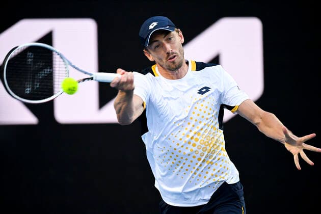 TENNIS AUSTRALIAN OPEN, John Millman of Australia plays a shot during his first Round Men s singles match against Feliciano Lopez of Spain on Day 1 of the Australian Open, at Melbourne Park, in Melbourne, Monday, January 17, 2022. ( NO ARCHIVING, EDITORIAL USE ONLY, NO USE IN BOOKS WITHOUT CONSENT MELBOURNE VIC AUSTRALIA  Copyright: xDEANxLEWINSx 20220117001614160132