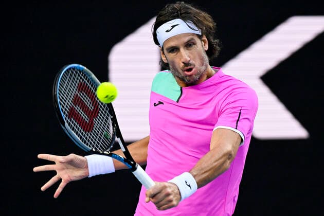 TENNIS AUSTRALIAN OPEN, Feliciano Lopez of Spain plays a shot during his first Round Men s singles match against John Millman of Australia on Day 1 of the Australian Open, at Melbourne Park, in Melbourne, Monday, January 17, 2022. ( NO ARCHIVING, EDITORIAL USE ONLY, NO USE IN BOOKS WITHOUT CONSENT MELBOURNE VIC AUSTRALIA  Copyright: xDEANxLEWINSx 20220117001614161854