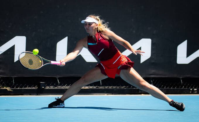 January 17, 2022, MELBOURNE, AUSTRALIA: Marta Kostyuk of Ukraine in action during the first round of the 2022 Australian Open Grand Slam tennis tournament against Diane Parry of France MELBOURNE AUSTRALIA - ZUMAa181 20220117_zaa_a181_131 Copyright: xRobxPrangex