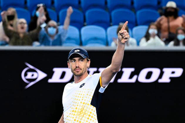 TENNIS AUSTRALIAN OPEN, John Millman of Australia celebrates after winning his first Round Men s singles match against Feliciano Lopez of Spain on Day 1 of the Australian Open, at Melbourne Park, in Melbourne, Monday, January 17, 2022. ( NO ARCHIVING, EDITORIAL USE ONLY, NO USE IN BOOKS WITHOUT CONSENT MELBOURNE VIC AUSTRALIA  Copyright: xDEANxLEWINSx 20220117001614186243