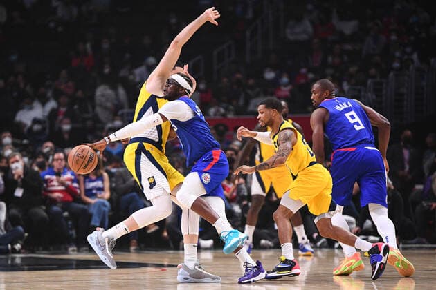 LOS ANGELES, CA - JANUARY 17: Los Angeles Clippers Guard Reggie Jackson (1) loses the ball trying to go around Indiana Pacers Forward Goga BItadze (88) during a NBA, Basketball Herren, USA game between the Indiana Pacers and the Los Angeles Clippers on January 17, 2022 at Crypto.com Arena in Los Angeles, CA. (Photo by Brian Rothmuller Icon Sportswire) NBA: JAN 17 Pacers at Clippers Icon220117009