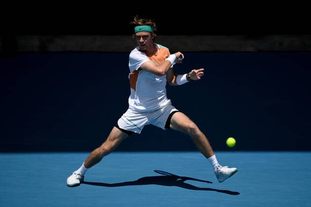 TENNIS AUSTRALIAN OPEN, Andrey Rublev of Russia plays a shot during the first round Men?s singles match against Gianluca Mager of Italy on Day 2 of the Australian Open, at Melbourne Park, in Melbourne, Tuesday, January 18, 2022. ( NO ARCHIVING, EDITORIAL USE ONLY, NO USE IN BOOKS WITHOUT CONSENT MELBOURNE VIC AUSTRALIA  Copyright: xJOELxCARRETTx 20220118001614361970