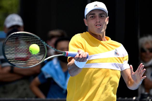 TENNIS AUSTRALIAN OPEN, Christopher O?Connell returns during his first round Men?s singles match against Hugo Gaston of France on Day 2 of the Australian Open, at Melbourne Park, in Melbourne, Tuesday, January 18, 2022. ( NO ARCHIVING, EDITORIAL USE ONLY, NO USE IN BOOKS WITHOUT CONSENT MELBOURNE VIC AUSTRALIA  Copyright: xDAVExHUNTx 20220118001614367171