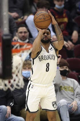 Brooklyn Nets Patty Mills (8) shoots a three against the Cleveland Cavaliers at Rocket Mortgage Field House in Cleveland, Ohio on Monday, January 17, 2022.  CLE20220117116 AARONxJOSEFCZYK