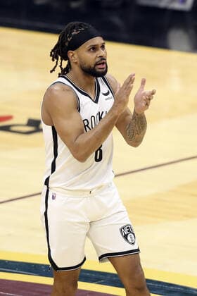 Brooklyn Nets Patty Mills (8) reacts after hitting a three against the Cleveland Cavaliers at Rocket Mortgage Field House in Cleveland, Ohio on Monday, January 17, 2022.  CLE20220117124 AARONxJOSEFCZYK