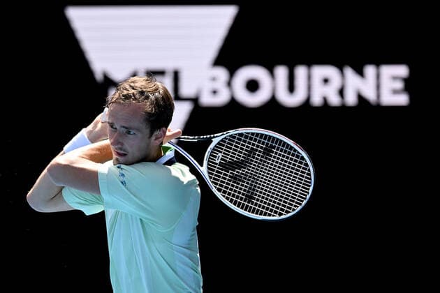 TENNIS AUSTRALIAN OPEN, Daniil Medvedev of Russia plays a shot during his first round Men?s singles match against Henri Laaksonen of Switzerland on Day 2 of the Australian Open, at Melbourne Park, in Melbourne, Tuesday, January 18, 2022. ( NO ARCHIVING, EDITORIAL USE ONLY, NO USE IN BOOKS WITHOUT CONSENT MELBOURNE VIC AUSTRALIA  Copyright: xDEANxLEWINSx 20220118001614373936