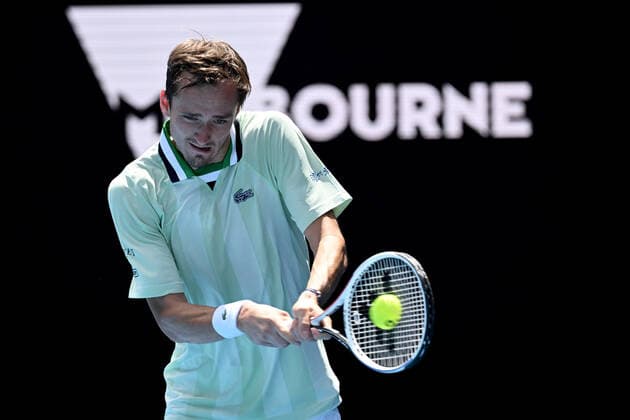 TENNIS AUSTRALIAN OPEN, Daniil Medvedev of Russia returns during his first round Men?s singles match against Henri Laaksonen of Switzerland on Day 2 of the Australian Open, at Melbourne Park, in Melbourne, Tuesday, January 18, 2022. ( NO ARCHIVING, EDITORIAL USE ONLY, NO USE IN BOOKS WITHOUT CONSENT MELBOURNE VIC AUSTRALIA  Copyright: xDEANxLEWINSx 20220118001614374011