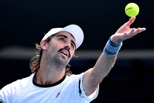 TENNIS AUSTRALIAN OPEN, Jordan Thompson of Australia serves during his first round Men?s singles match against Steve Johnson of the USA on Day 2 of the Australian Open, at Melbourne Park, in Melbourne, Tuesday, January 18, 2022. ( NO ARCHIVING, EDITORIAL USE ONLY, NO USE IN BOOKS WITHOUT CONSENT MELBOURNE VIC AUSTRALIA  Copyright: xDAVExHUNTx 20220118001614378679