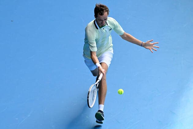 TENNIS AUSTRALIAN OPEN, Daniil Medvedev of Russia returns during the first round Men?s singles match against Henri Laaksonen of Switzerland on Day 2 of the Australian Open, at Melbourne Park, in Melbourne, Tuesday, January 18, 2022. ( NO ARCHIVING, EDITORIAL USE ONLY, NO USE IN BOOKS WITHOUT CONSENT MELBOURNE VIC AUSTRALIA  Copyright: xDEANxLEWINSx 20220118001614385545