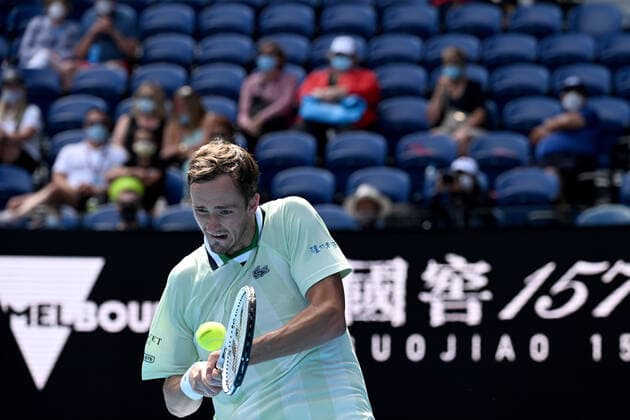 TENNIS AUSTRALIAN OPEN, Daniil Medvedev of Russia plays a return shot during his first round Men?s singles match against Henri Laaksonen of Switzerland on Day 2 of the Australian Open, at Melbourne Park, in Melbourne, Tuesday, January 18, 2022. ( NO ARCHIVING, EDITORIAL USE ONLY, NO USE IN BOOKS WITHOUT CONSENT MELBOURNE VIC AUSTRALIA  Copyright: xDEANxLEWINSx 20220118001614385662
