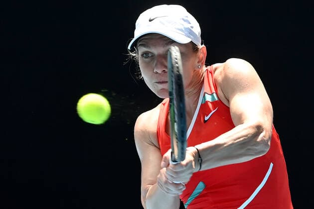TENNIS AUSTRALIAN OPEN, Simona Halep of Romania returns during her first round Women?s singles match against Magdalena Frech of Poland on Day 2 of the Australian Open, at Melbourne Park, in Melbourne, Tuesday, January 18, 2022. ( NO ARCHIVING, EDITORIAL USE ONLY, NO USE IN BOOKS WITHOUT CONSENT MELBOURNE VIC AUSTRALIA  Copyright: xJOELxCARRETTx 20220118001614385873