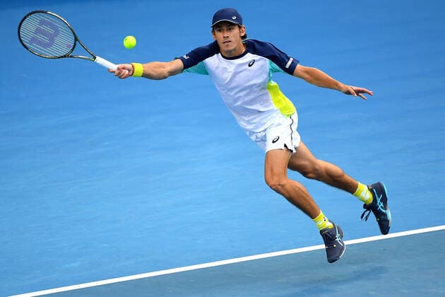 TENNIS AUSTRALIAN OPEN, Alex de Minaur of Australia plays a return during his first round singles match against Lorenzo Musetti of Italy on Day 2 of the Australian Open, at Melbourne Park, in Melbourne, Tuesday, January 18, 2022. ( NO ARCHIVING, EDITORIAL USE ONLY, NO USE IN BOOKS WITHOUT CONSENT MELBOURNE VIC AUSTRALIA  Copyright: xJAMESxROSSx 20220118001614401285