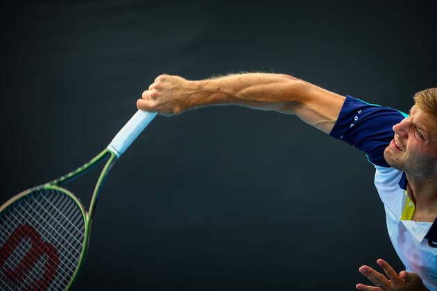 David Goffin ATP, Tennis Herren 45) pictured in action at a tennis match between Belgian Goffin and British Evans, in the first round of the men s singles at the Australian Open Grand Slam tennis tournament, Tuesday 18 January 2022 in Melbourne Park, Melbourne, Australia. The 2022 edition of the Australian Grand Slam takes place from January 17th to January 30th. PATRICKxHAMILTON  x3480452x