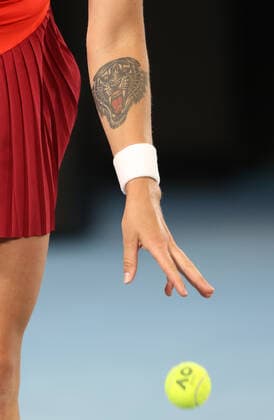 (220118) -- MELBOURNE, Jan. 18, 2022 -- A tatoo of Aryna Sabalenka of Belarus is seen during the Women s Singles first round match against Storm Sanders of Australia at Australian Open in Melbourne Park in Melbourne, Australia, on Jan. 18, 2022. ) (SP)AUSTRALIA-MELBOURNE-TENNIS-AUSTRALIAN OPEN-WOMEN S SINGLES BaixXuefei 
