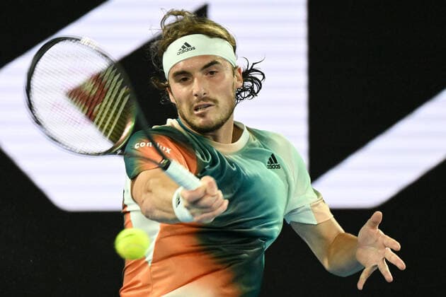 TENNIS AUSTRALIAN OPEN, Stefanos Tsitsipas of Greece in action during his round 1 match against Mikael Ymer of Sweden on Day 2 of the Australian Open at Melbourne Park, in Melbourne, Tuesday, January 18, 2022. ( NO ARCHIVING, EDITORIAL USE ONLY, NO USE IN BOOKS WITHOUT CONSENT MELBOURNE VIC AUSTRALIA  Copyright: xDEANxLEWINSx 20220118001614435818