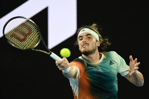 TENNIS AUSTRALIAN OPEN, Stefanos Tsitsipas of Greece in action during his round 1 match against Mikael Ymer of Sweden on Day 2 of the Australian Open at Melbourne Park, in Melbourne, Tuesday, January 18, 2022. ( NO ARCHIVING, EDITORIAL USE ONLY, NO USE IN BOOKS WITHOUT CONSENT MELBOURNE VIC AUSTRALIA  Copyright: xDEANxLEWINSx 20220118001614435862