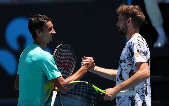 Mandatory Credit: Photo by Ella Ling Shutterstock (12763715av) Lorenzo Sonego commiserates with Oscar Otte after his second round win Australian Open, Day Three, Tennis, Melbourne Park, Melbourne, Australia - 19 Jan 2022 Australian Open, Day Three, Tennis, Melbourne Park, Melbourne, Australia - 19 Jan 2022 Copyright: xEllaxLing Shutterstockx 12763715av