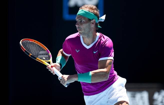 Mandatory Credit: Photo by Ella Ling Shutterstock (12763715bf) Rafael Nadal in second round action Australian Open, Day Three, Tennis, Melbourne Park, Melbourne, Australia - 19 Jan 2022 Australian Open, Day Three, Tennis, Melbourne Park, Melbourne, Australia - 19 Jan 2022 Copyright: xEllaxLing Shutterstockx 12763715bf
