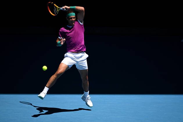 TENNIS AUSTRALIAN OPEN, Rafael Nadal of Spain plays a shot during his second round Men?s singles match against Yannick Hanfmann of Germany on Day 3 of the Australian Open, at Melbourne Park, in Melbourne, Wednesday, January 19, 2022. ( NO ARCHIVING, EDITORIAL USE ONLY, NO USE IN BOOKS WITHOUT CONSENT MELBOURNE VIC AUSTRALIA  Copyright: xDAVExHUNTx 20220119001614639590