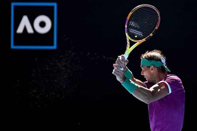TENNIS AUSTRALIAN OPEN, Rafael Nadal of Spain plays a shot during his second round Men?s singles match against Yannick Hanfmann of Germany on Day 3 of the Australian Open, at Melbourne Park, in Melbourne, Wednesday, January 19, 2022. ( NO ARCHIVING, EDITORIAL USE ONLY, NO USE IN BOOKS WITHOUT CONSENT MELBOURNE VIC AUSTRALIA  Copyright: xDEANxLEWINSx 20220119001614649741