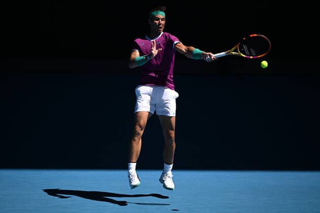 TENNIS AUSTRALIAN OPEN, Rafael Nadal of Spain plays a shot during his second round Men?s singles match against Yannick Hanfmann of Germany on Day 3 of the Australian Open, at Melbourne Park, in Melbourne, Wednesday, January 19, 2022. ( NO ARCHIVING, EDITORIAL USE ONLY, NO USE IN BOOKS WITHOUT CONSENT MELBOURNE VIC AUSTRALIA  Copyright: xDAVExHUNTx 20220119001614657376
