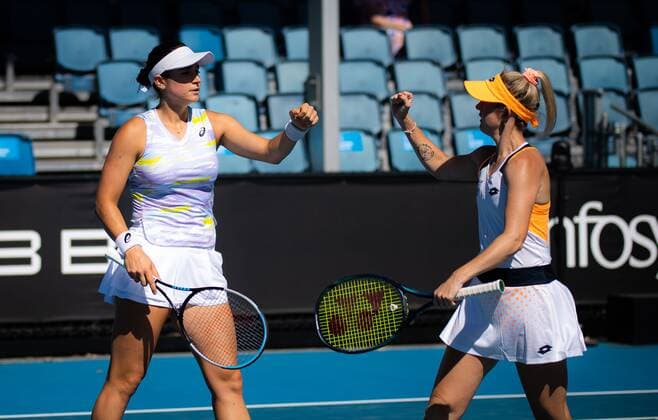 Mandatory Credit: Photo by Rob Prange Shutterstock (12763713dy) Storm Sanders of Australia & Caroline Dolehide of the United States in action during the first round of doubles at the 2022 Australian Open Grand Slam tennis tournament Australian Open, Day Three, Tennis, Melbourne Park, Melbourne, Australia - 19 Jan 2022 Australian Open, Day Three, Tennis, Melbourne Park, Melbourne, Australia - 19 Jan 2022 Copyright: xRobxPrange Shutterstockx 12763713dy