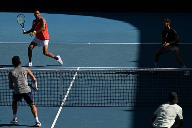TENNIS AUSTRALIAN OPEN, Nick Kyrgios (left) and Thanasi Kokkinakis of Australia during their first round Men?s doubles match against Alex Bolt and James McCabe of Australia on Day 3 of the Australian Open, at Melbourne Park, in Melbourne, Wednesday, January 19, 2022. ( NO ARCHIVING, EDITORIAL USE ONLY, NO USE IN BOOKS WITHOUT CONSENT MELBOURNE VIC AUSTRALIA  Copyright: xDEANxLEWINSx 20220119001614660174