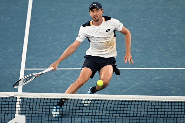 TENNIS AUSTRALIAN OPEN, John Millman of Australia plays a shot during his second round Men?s singles match against Alexander Zverev of Germany on Day 3 of the Australian Open, at Melbourne Park, in Melbourne, Wednesday, January 19, 2022. ( NO ARCHIVING, EDITORIAL USE ONLY, NO USE IN BOOKS WITHOUT CONSENT MELBOURNE VIC AUSTRALIA  Copyright: xDAVExHUNTx 20220119001614701286
