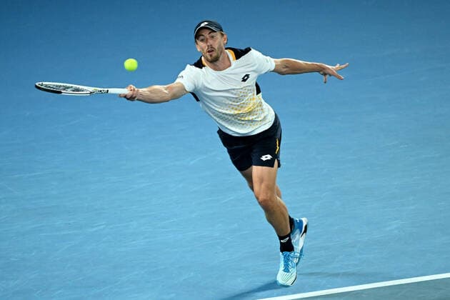 TENNIS AUSTRALIAN OPEN, John Millman of Australia plays a shot during his second round Men?s singles match against Alexander Zverev of Germany on Day 3 of the Australian Open, at Melbourne Park, in Melbourne, Wednesday, January 19, 2022. ( NO ARCHIVING, EDITORIAL USE ONLY, NO USE IN BOOKS WITHOUT CONSENT MELBOURNE VIC AUSTRALIA  Copyright: xDAVExHUNTx 20220119001614701317