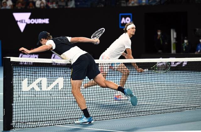 Mandatory Credit: Photo by James Gourley Shutterstock (12763717gu) Alexander Zverev and John Millman during their second round match Australian Open, Day Three, Tennis, Melbourne Park, Melbourne, Australia - 19 Jan 2022 Australian Open, Day Three, Tennis, Melbourne Park, Melbourne, Australia - 19 Jan 2022 Copyright: xJamesxGourley Shutterstockx 12763717gu